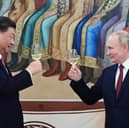 Chinese president Xi Jinping toasts blood-soaked Russian despot Vladimir Putin during a visit to the Kremlin in 2023 (Picture: Pavel Byrkin)