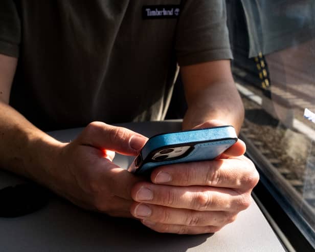 Passengers who play music on their phones’ loudspeakers can be a real nuisance (Picture: Hans Lucas)