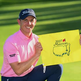 Grant Forrest poses with Masters flag after securing his Augusta National debut through winning the Open de Espana on Sunday