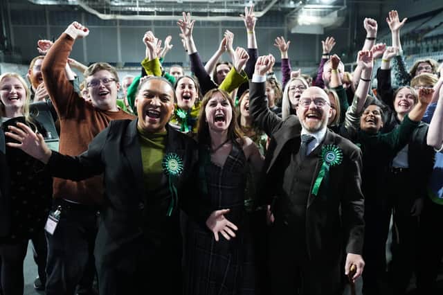 Iris Duane MSP, Holly Bruce MSP and Patrick Harvie MSP celebrate with the Glasgow Greens.