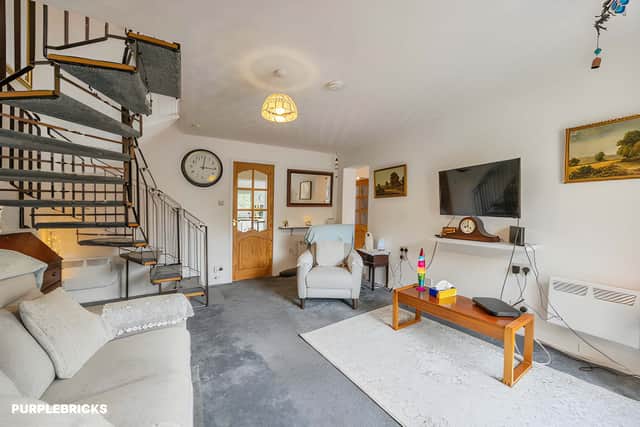 The bright, spacious lounge provides a welcoming main living area, with room to relax and spend time with family or visitors