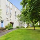 This one-bedroom flat on Barntongate Drive is on the market for £170,000, with a private garage and no factor fees adding to its appeal