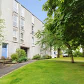 This one-bedroom flat on Barntongate Drive is on the market for £170,000, with a private garage and no factor fees adding to its appeal