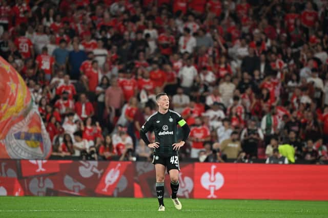 Celtic captain Callum McGregor looks dejected after the concession of Benfica's third goal