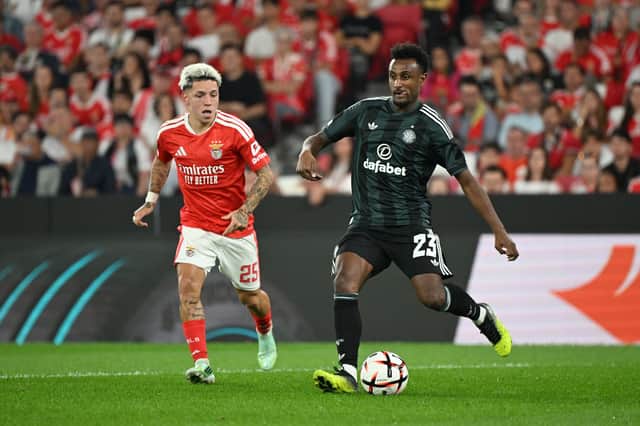 Celtic's Haissem Hassan and Benfica's Gianluca Prestianni battle for the ball