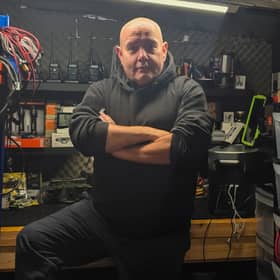 Disaster prepper ‘Brian Forbes' inside his shelter, stocked with a host of supplies