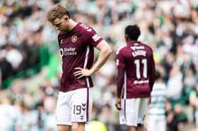 Hearts' Stuart Findlay looks crestfallen after losing the title at Celtic Park last season.
