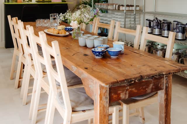 People enjoy cooking and eating together at the Yarrow Cookery School classes.