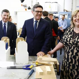 Prime Minister Andy Burnham and Scottish Secretary Douglas Alexander during a visit to to a college in Motherwell