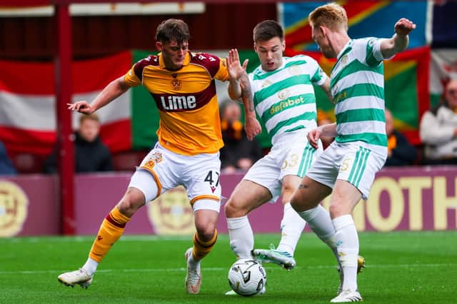 Seb Palmer-Houlden in action against Celtic's Kieran Tierney and Liam Scales during a William Hill Premiership match between Celtic and Motherwell