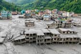 Buildings deluged in sludge in Devighat in Nepal's Nuwakot district after flash floods hit the area in August. More than 1,400 bodies have been found and thousands more are still missing. Picture: Prabin Ranabhat