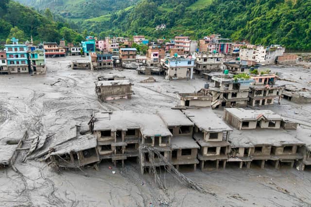 Buildings deluged in sludge in Devighat in Nepal's Nuwakot district after flash floods hit the area in August. More than 1,400 bodies have been found and thousands more are still missing. Picture: Prabin Ranabhat