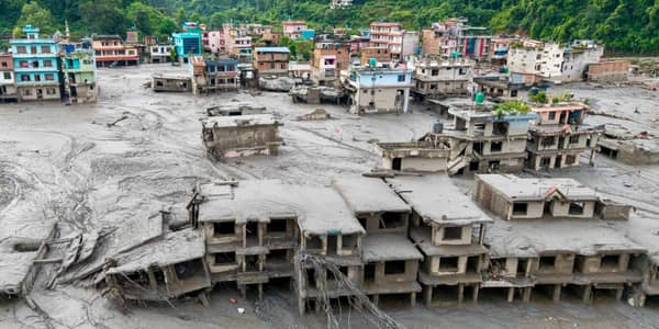 Buildings deluged in sludge in Devighat in Nepal's Nuwakot district after flash floods hit the area in August. More than 1,400 bodies have been found and thousands more are still missing. Picture: Prabin Ranabhat