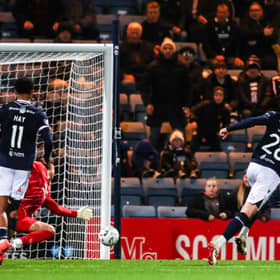  Dundee's Callum Jones scores to make it 2-2 against Rangers at Dens Park