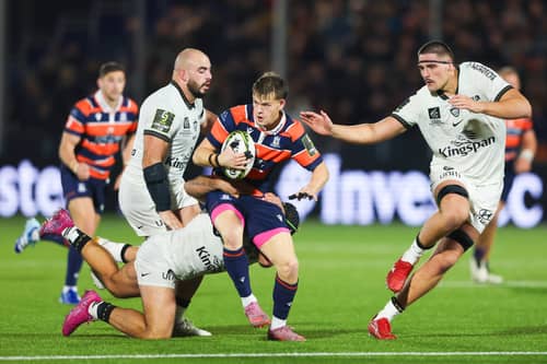 Toulon get to grips with Edinburgh Rugby scrum-half Hector Patterson.