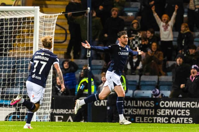 Callum Jones celebrates after scoring Dundee's equaliser against Rangers