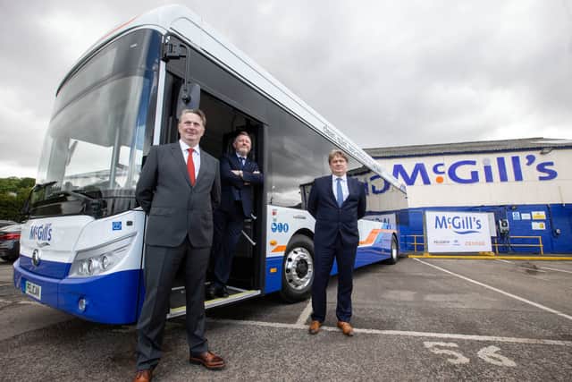 Sandy Easdale, McGill’s CEO Ralph Roberts and James Easdale