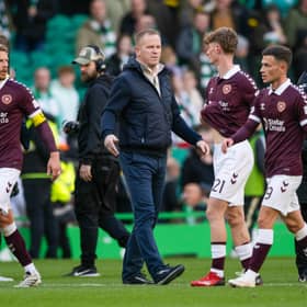 Hearts head coach Wouter Vrancken and his players after the defeat by Celtic.