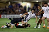 Montpellier's Adam Hastings offloads during the win over Bath.
