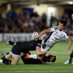 Montpellier's Adam Hastings offloads during the win over Bath.