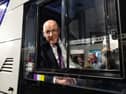 John Swinney in the driver's seat of a First Bus at a trade stand at the SNP party conference in Aberdeen. Picture: Paul Reid