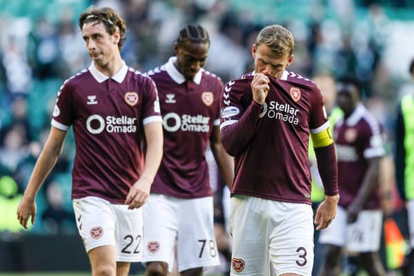 Hearts' Stephen Kingsley (R) at full time after the 7-1 defeat by Celtic. (Photo by Craig Foy / SNS Group)