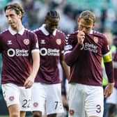 Hearts' Stephen Kingsley (R) at full time after the 7-1 defeat by Celtic. (Photo by Craig Foy / SNS Group)