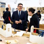 Andy Burnham speaks to a student during a visit to New College Lanarkshire's Motherwell Campus ahead of a speech focusing on the forming of closer ties with the Scottish government. Picture: Jeff J Mitchell