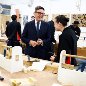 Andy Burnham speaks to a student during a visit to New College Lanarkshire's Motherwell Campus ahead of a speech focusing on the forming of closer ties with the Scottish government. Picture: Jeff J Mitchell