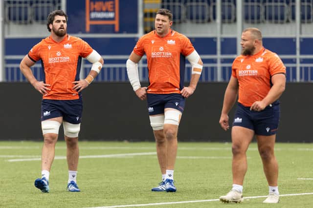 Grant Gilchrist, centre, during an Edinburgh Rugby training session at Hive Stadium, alongside Marshall Sykes, left, and Pierre Schoeman.