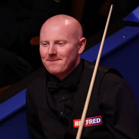Scotland's Anthony McGill is looking to bag a place in the last 16 this evening.