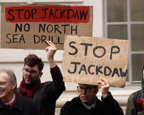 People protest outside the Department for Energy Security and Net Zero in London over the UK government's decision to approve the Jackdaw gas field. Picture: Brook Mitchell