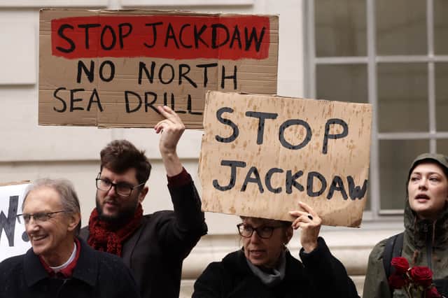 People protest outside the Department for Energy Security and Net Zero in London over the UK government's decision to approve the Jackdaw gas field. Picture: Brook Mitchell