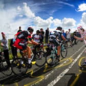 Picture by Simon Hulme/YPN - 06/07/2014 - Cycling - Tour de France 2014: Stage 2, York to Sheffield - Yorkshire, England - Crowds cheer on the cyclist's as they head up the gruelling Holme Moss Climb, Holme Moss Dale, West Yorkshire in the Yorkshire Grand Depart of the 2014 Tour de France. 6th July 2014 -  Cycling fans spectators, flags line the route -

The Grand Depart of the Tour de France 2027 and The Grand Depart of the Tour de France Femmes avec Zwift 2027. Both Races will start in the United Kingdom and visit Scotland, Wales and England - ALL IMAGES © www.SWpix.com ( Photography Hub Ltd ) from the SWpix.com photography archive - MANDATORY BYLINE/PHOTO CREDIT to Photographers Name/SWpix.com/LeTourGB (strictly editorial use only - contact for commercial - simon@swpix.com )