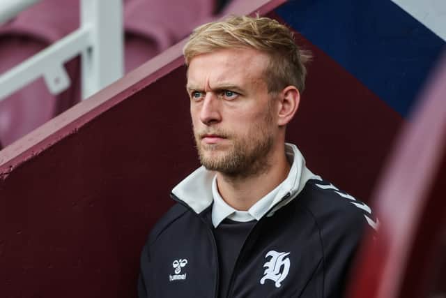 Harry Milne has suffered a knee injury.