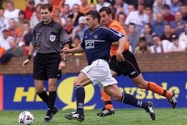 Georgi Nemsadze beats David Hannah to the ball