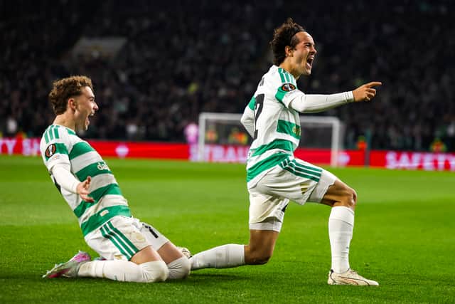 Mika Baur celebrates with Celtic team-mate Callum Osmand after scoring to make it 1-0 against Celta Vigo