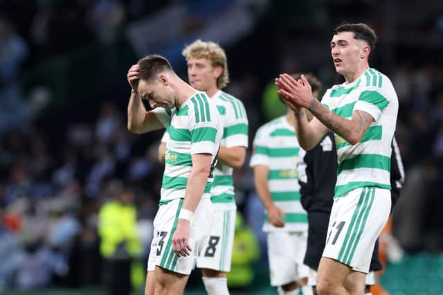 Kieran Tierney and Colby Donovan of Celtic look dejected after the team's 2-1 Europa League defeat to Celta Vigo
