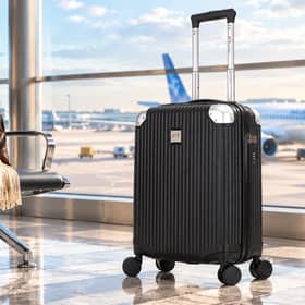 The ATX Luggage 21-inch hard-shell cabin suitcase has a 33-litre capacity, four dual spinner wheels and a built-in three-digit lock.
