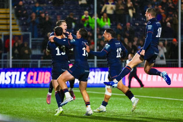 Edinburgh's Hector Patterson celebrates with team mates after scoring a try during the win over Lions at Hive Stadium. (Photo by Ewan Bootman / SNS Group)