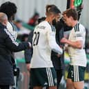 Celtic defender Alistair Johnston was forced off after only 21 minutes on his comeback from an 11-week injury layoff at Easter Road