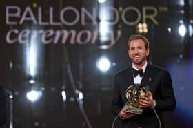 England and Bayern Munich forward Harry Kane receives the 2026 Ballon d'Or award at the Palladium Theatre in London. (Photo by FRANCK FIFE / AFP via Getty Images)