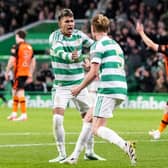 Liam Scales celebrates his equaliser for Celtic against Dundee United with Camilo Duran. Cr: SNS Group.