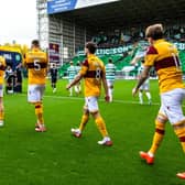  Motherwell's Alex Lowry and Lukas Fadinger during a William Hill Premiership match between Celtic and Motherwell 