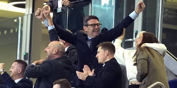 Prime Minister Andy Burnham and wife Marie France Van Heel celebrate in the stands at Everton's Hill Dickinson Stadium