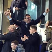 Prime Minister Andy Burnham and wife Marie France Van Heel celebrate in the stands at Everton's Hill Dickinson Stadium