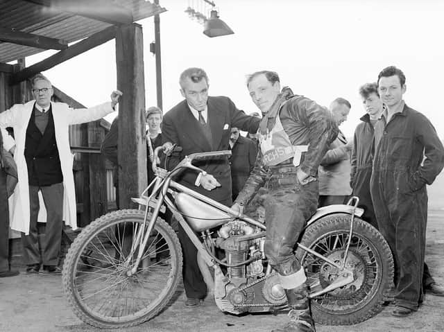 Ron Johnston and Doug Templeton discuss tactic in 1960. Picture: TSPL