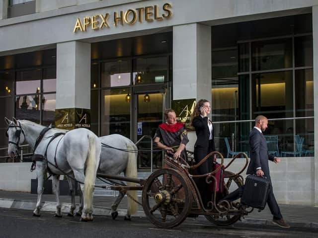 Guests arrived at the opening of the 35m Apex City of Bath Hotel in a Roman chariot. The hotel has 'performed particularly well' in its first year of trading. Picture: Contributed