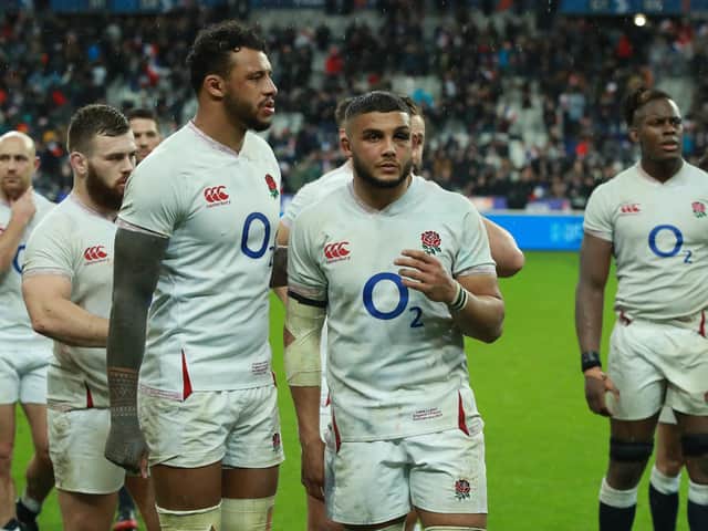 Lewis Ludlam (centre) with Courtney Lawes after the France defeat. The flanker has  promised Scotlanda 'war' when they visit on Calcutta Cup duty