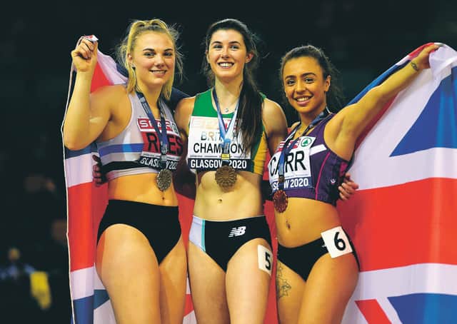 Scotland's Alisha Rees, left, celebrates her 60m silver medal alongside winner Amy Hunt, centre, and third-placed Ebony Carr at the SPAR British Athletics Indoor Championshipsin Glasgow. Picture: Ian Rutherford/PA Wire